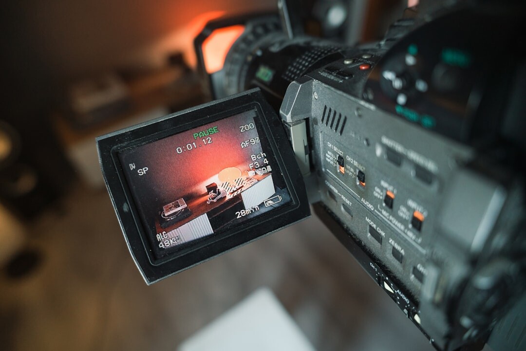 Professional broadcast camera in a news studio on a tripod